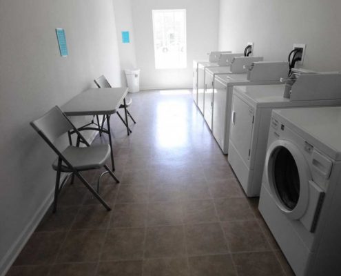 Preston Pointe Senior Apartments Laundry Room